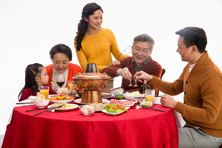 女儿背景分离30岁到34岁幸福家庭过年吃团圆饭温馨高清图片素材