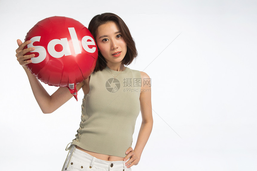 亚洲人放松仅女人快乐的年轻女孩拿着气球图片