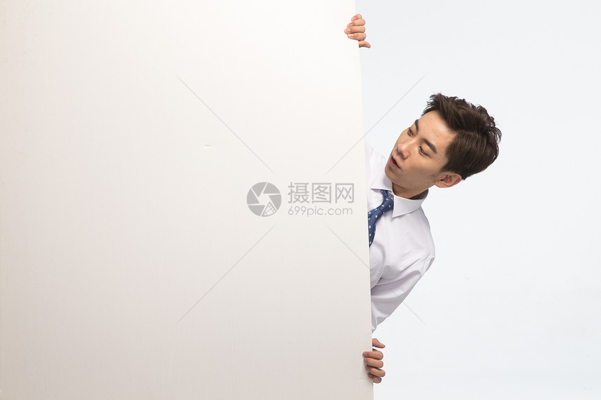自信影棚拍摄办公室职员商务青年男人拿着白板图片