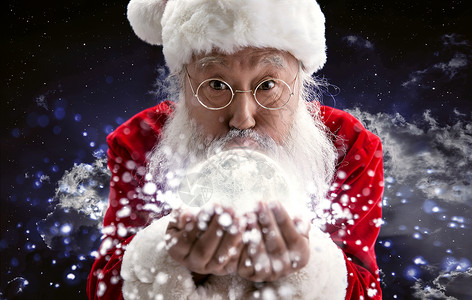 装饰胡子胡须穿着圣诞服的老年人变魔法背景