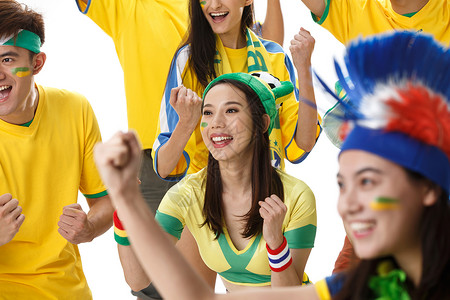 亚洲欢乐激情青年球迷看比赛欢呼图片素材