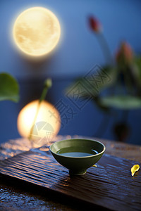 池塘月色中秋节月饼和月亮创意摆拍背景