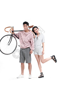 连帽运动外套两个人亚洲青年情侣和自行车高清图片