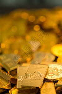 传统文化金子金色金币和金条背景图片