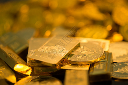 金色赚钱硬币金币和金条金子高清图片素材