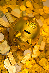 闪亮的金币和存钱罐背景图片
