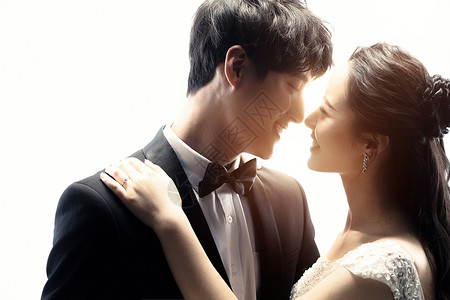 订婚素材订婚25岁到29岁青年夫妇浪漫的新郎和新娘背景