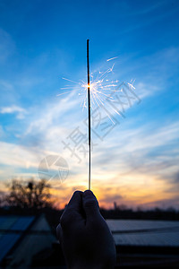 彩色漂浮礼花喜庆彩色图片天空手那烟花背景