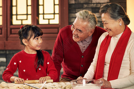 彩色图片亚洲人幸福家庭过年包饺子图片