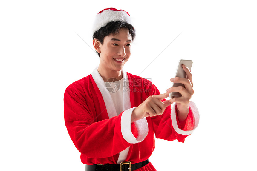 穿圣诞服的青年男人使用手机图片