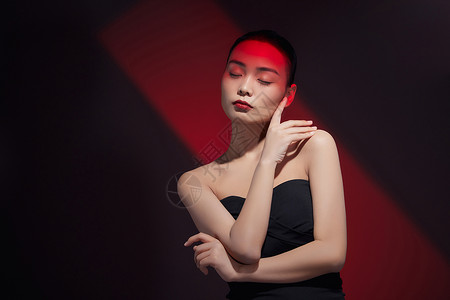 红黑时尚美妆女性背景图片