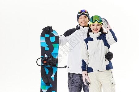年轻情侣相约一起滑雪图片