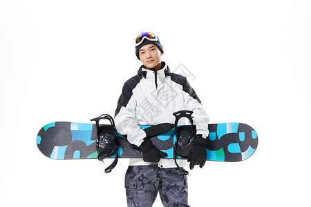 男青年拿着滑雪板图片