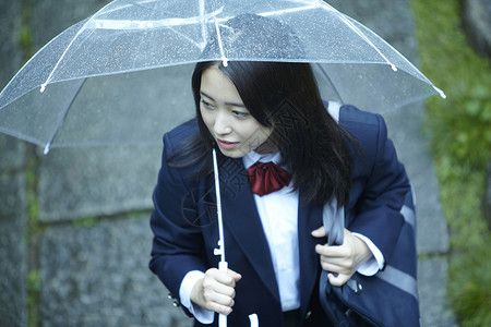 撑伞的女高中生女人高清图片素材