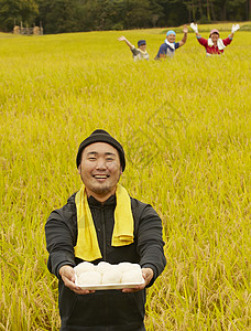 农业工作者水稻米丰收稻穗高清图片素材