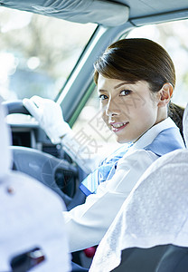 开车的女出租车司机商务高清图片素材