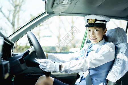 开车的女出租车司机工作高清图片素材
