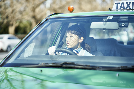 开车的女出租车司机日本高清图片素材