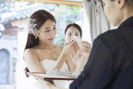 在内快乐韩国人婚纱店婚纱婚礼策划新婚夫妇婚礼准备背景图片