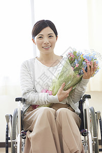 疗法乐趣患者轮椅上的女人背景图片