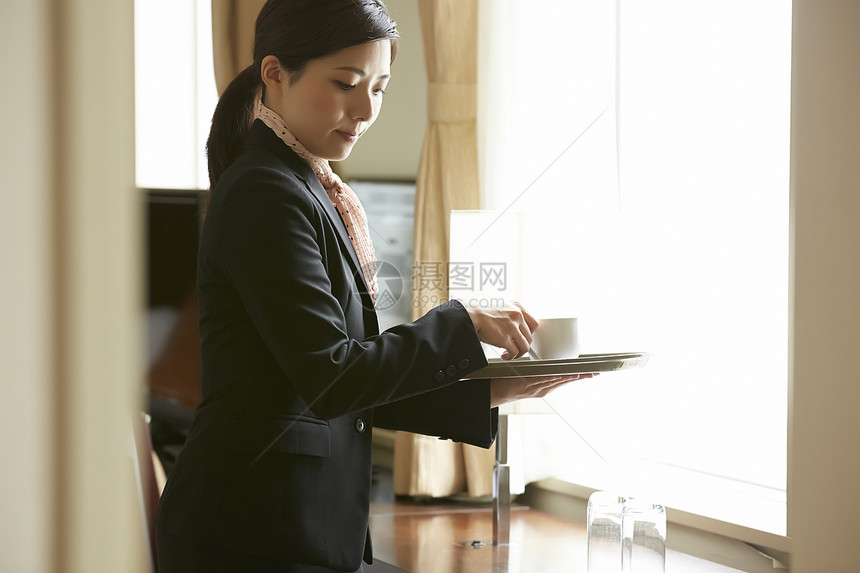 杯子使用工具职业女在酒店工作的女图片