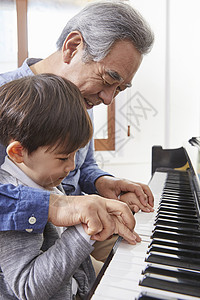 键盘乐器韩国分钟祖父孙子钢琴大学生高清图片素材