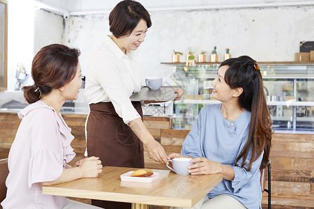 中年闺蜜咖啡厅聚会伙伴高清图片素材