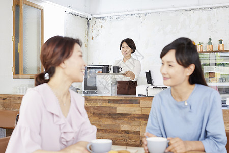 中年闺蜜咖啡厅聚会韩国人高清图片素材