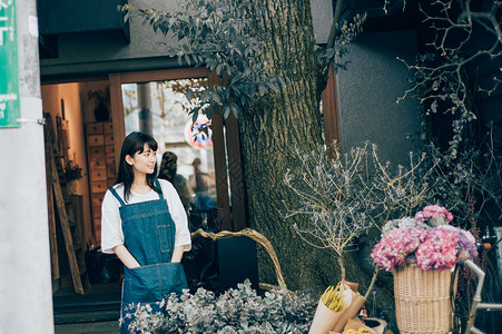 花店店面兼职工作漂亮花店女职工背景