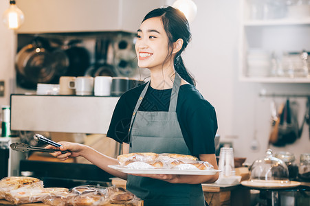 餐厅里兼职的女性自然高清图片素材