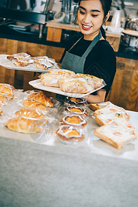 面包店工作的女职员职业高清图片素材
