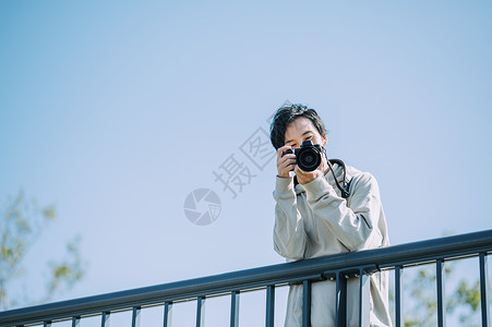 照相机亚洲休息相机和男图片