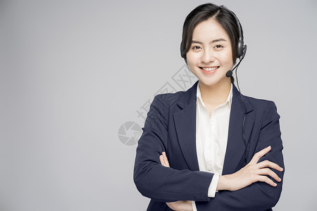 带着耳麦的女性客服背景图片