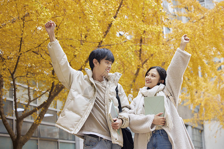 加油吧同学加油奋斗的校园男女背景