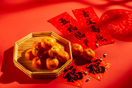 虎年春节谨贺新年年货橘子和春联背景