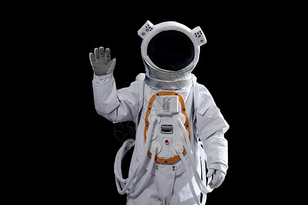 太空中的宇航员挥手打招呼形象背景图片