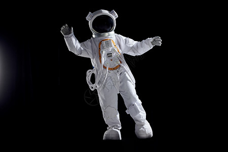 创意宇航员悬浮在太空中背景图片