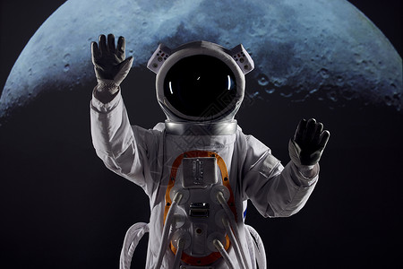 创意宇航员触碰虚拟屏幕背景图片