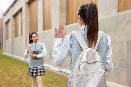 青年学生面对面打招呼图片素材