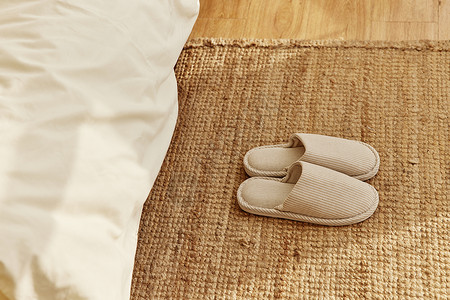 床边地毯卧室床边的居家拖鞋背景
