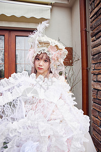 白百何时尚新娘手拿白伞的洛丽塔女孩背景