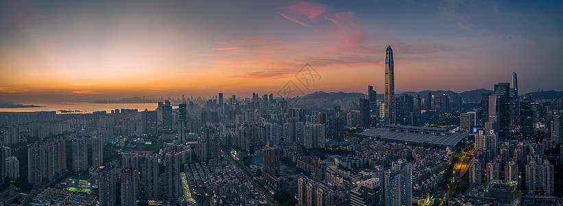 夜幕降临下的深圳照耀城市建筑夜景高清图片素材