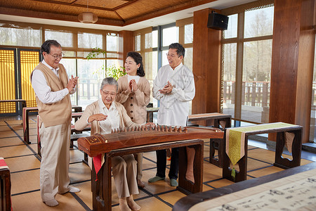 潮流服饰促销老年人聚会弹奏古筝背景