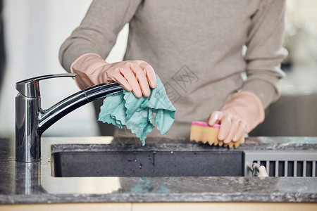 做家务女人居家洗碗的女性手部特写背景
