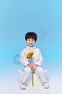 少年成长手拿向日葵的少年背景