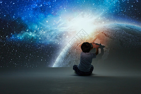 蓝色光感地球小男孩体验宇宙星河背景
