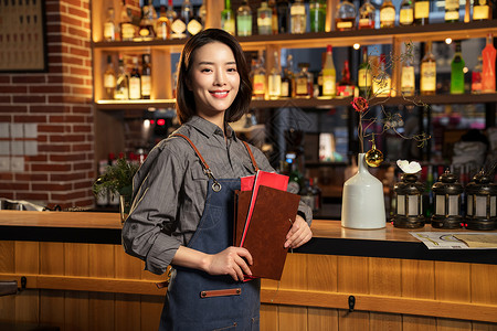 女服务生拿着菜单的餐吧女服务员背景