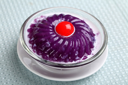 中式甜点紫芋布丁背景图片