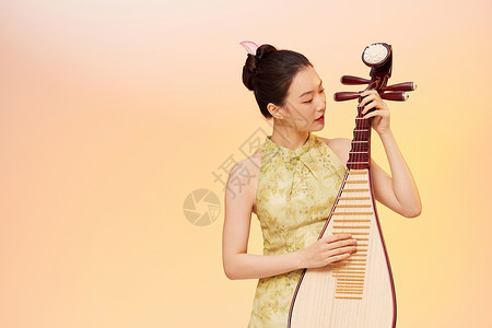 琵琶乐器国潮风女性弹奏琵琶背景