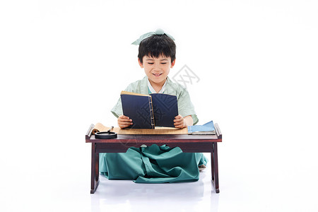 阅读国学书籍的男孩背景图片